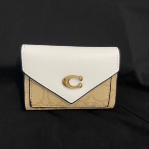 Monedero Coach